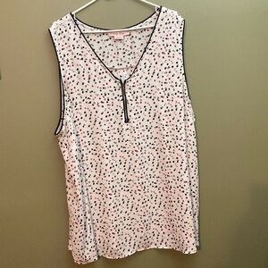 In every story white dot blouse tank with front zipper.